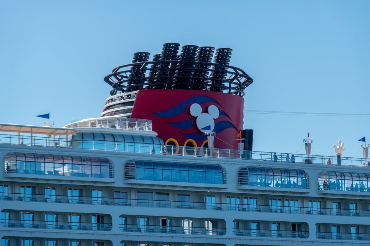 The red funnel and decks of the Disney Wonder cruise ship in Sydney Harbour